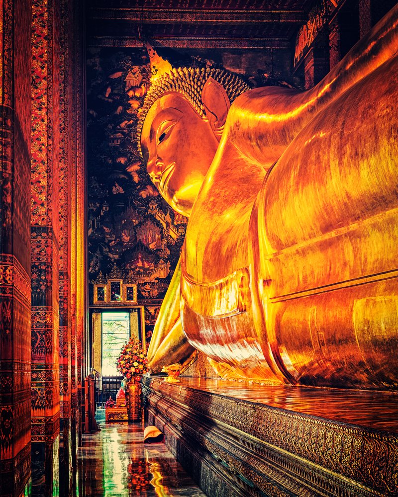 Vintage retro effect filtered hipster style image of reclining Buddha gold statue. Wat Pho, Bangkok, Thailand. Reclining Buddha, Thailand
