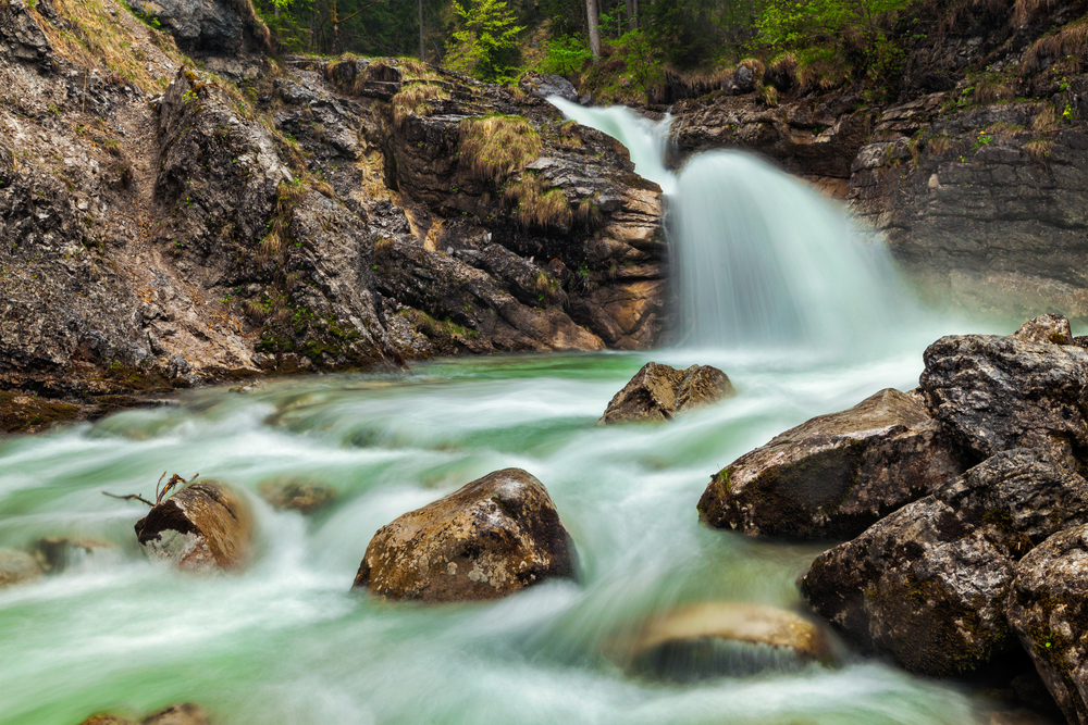 Cascade of Kuhfluchtwasserfall. Long exposure for motion blur. Farchant, Garmisch-Partenkirchen, Bavaria, Germany. Cascade of Kuhfluchtwasserfall. Farchant, Garmisch-Partenkirchen