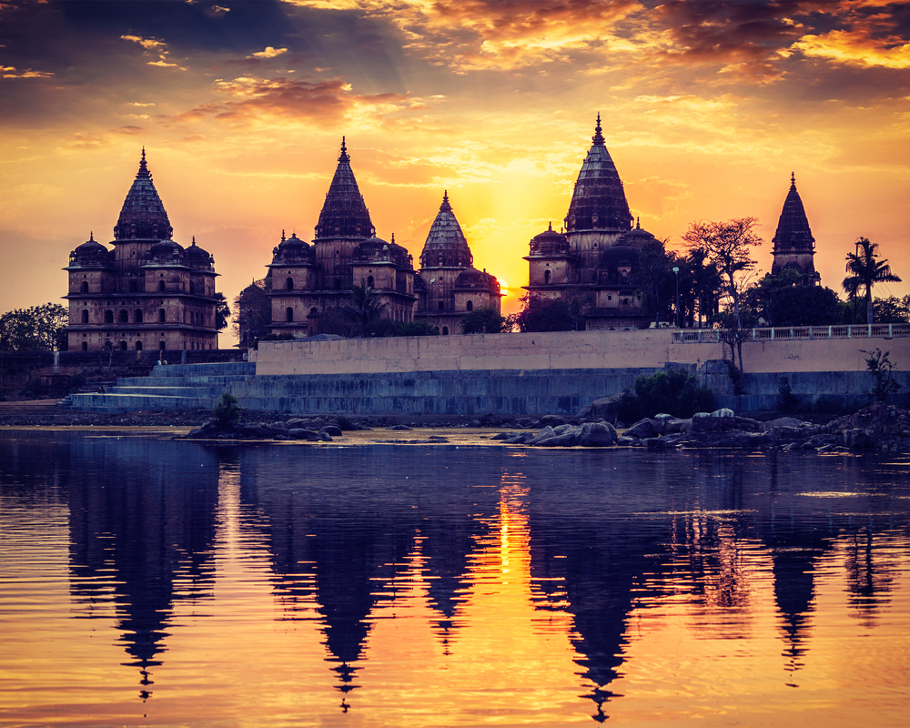 Vintage retro effect filtered hipster style image of Royal cenotaphs of Orchha over Betwa river. Orchha, Madhya Pradesh, India. Royal cenotaphs of Orchha, Madhya Pradesh, India