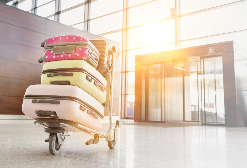 Photo of baggage on cart with lens flare