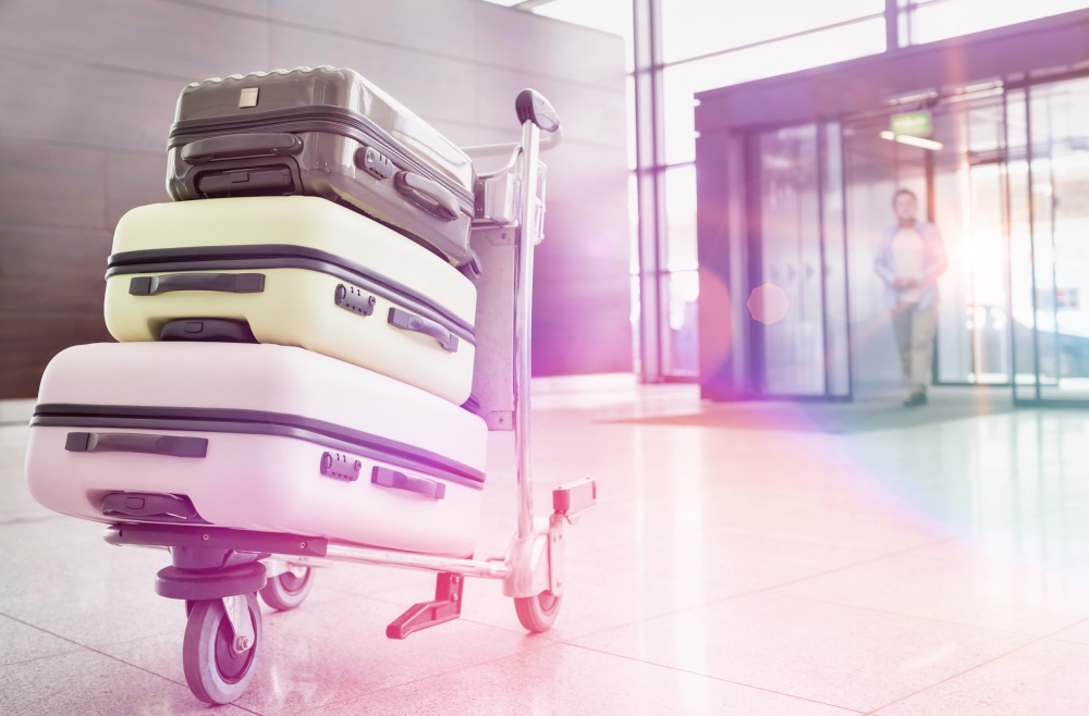 Photo of baggage on cart with lens flare