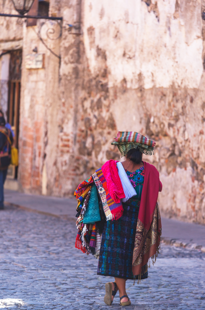 Local woman in street market in Antigua, Guatemala