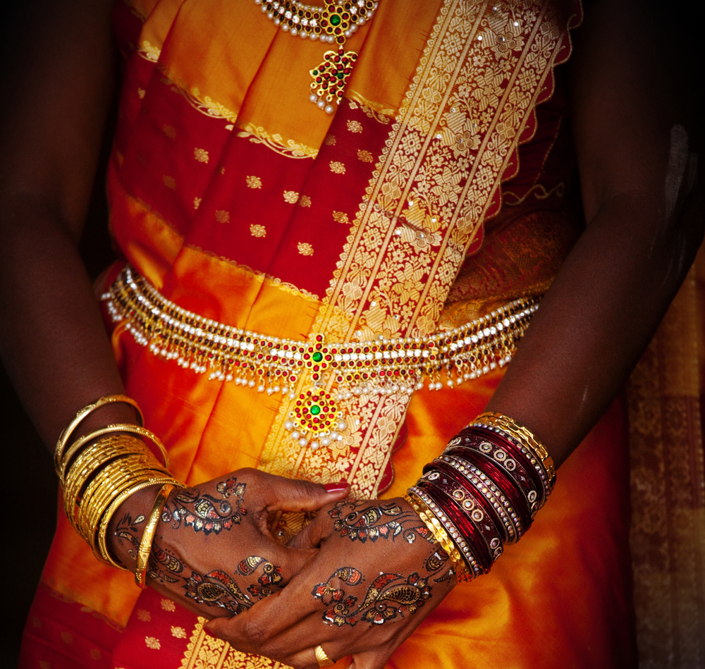bangles, rings and wedding pattern on hands