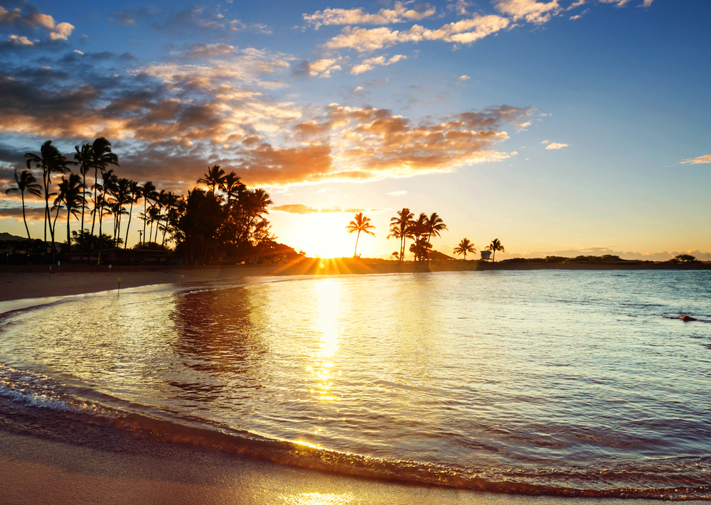 Amazing hawaiian beach at fantastic sunset. Beautiful holidays background.