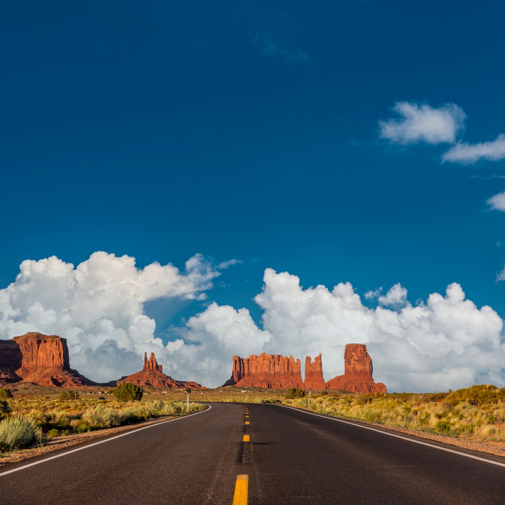 Empty scenic highway in Monument Valley, Arizona, USA