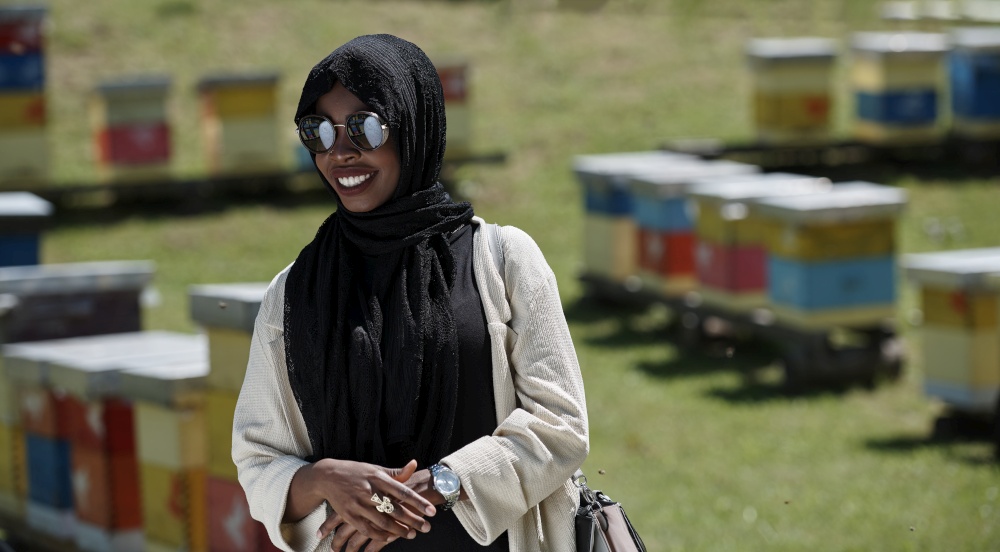 black african muslim businesswoman portrait  on small local  honey production farm