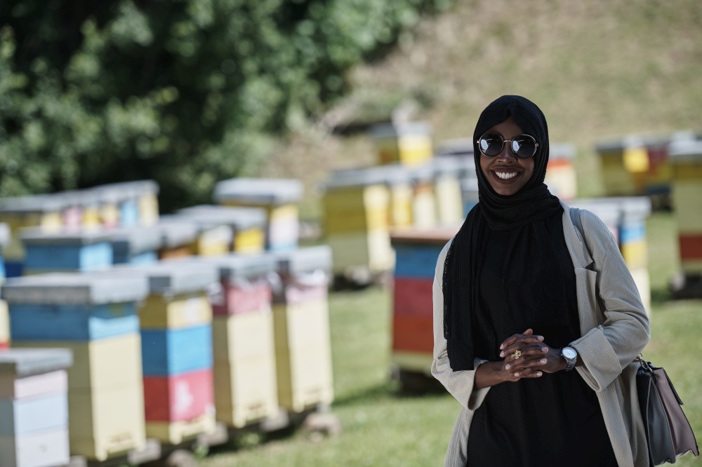 black african muslim businesswoman portrait  on small local  honey production farm