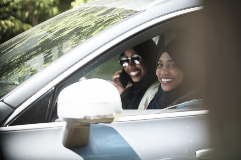 Arabic Woman Couple Traveling By Luxury  Car in Saudy Arabia