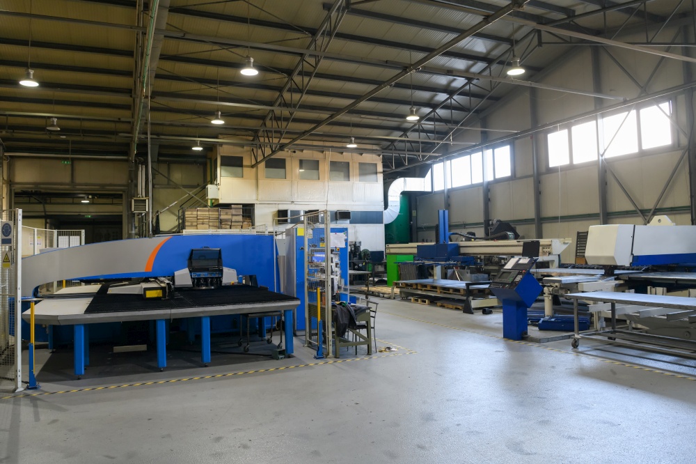 modern industrial factory for mechanical engineering equipment and machines manufacture of a production hall. High quality photo. modern industrial factory for mechanical engineering equipment and machines manufacture of a production hall