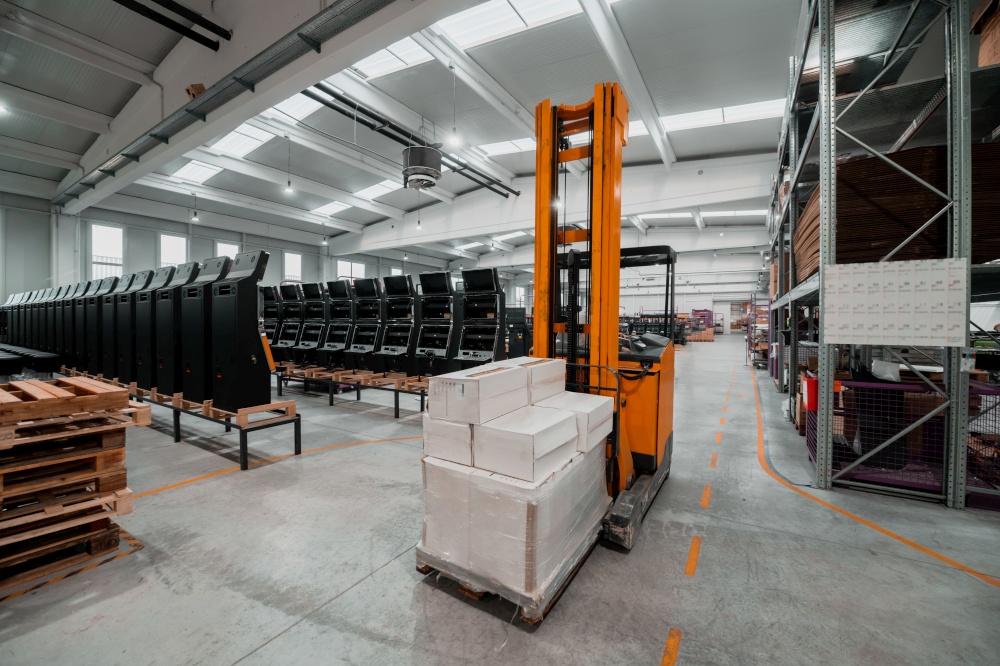 Forklift loader in storage warehouse ship yard. Distribution products. Delivery. Logistics. Transportation. Business background. High quality photo. Forklift loader in storage warehouse ship yard. Distribution products. Delivery. Logistics. Transportation. Business background
