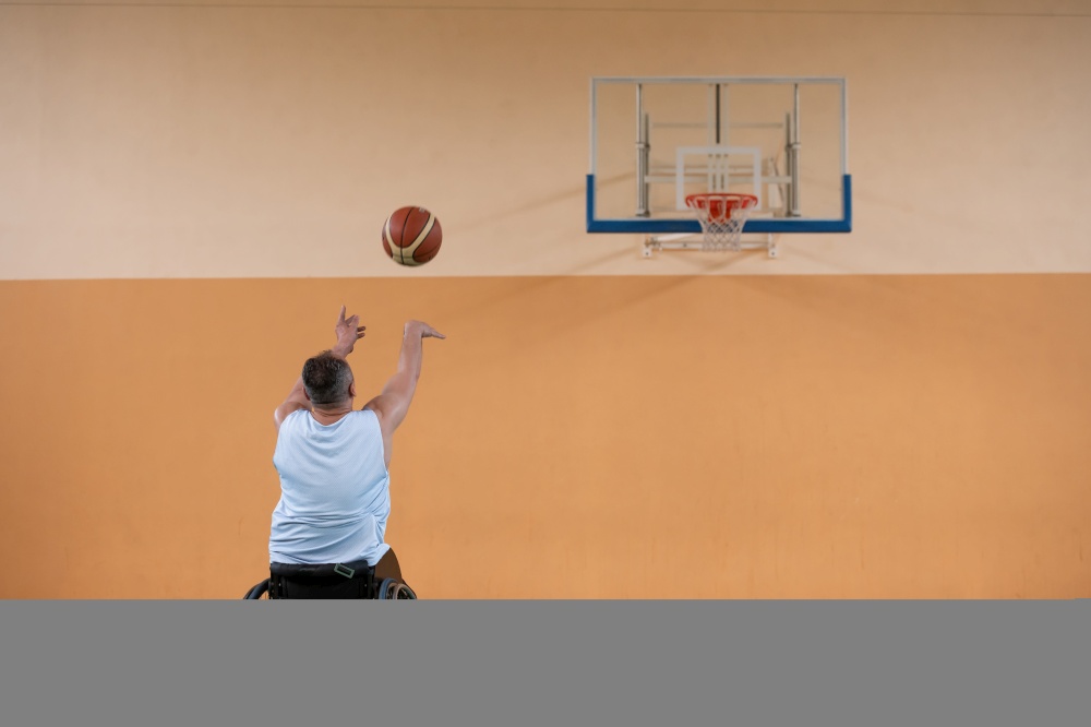 a photo of a war veteran playing basketball with a team in a modern sports arena. The concept of sport for people with disabilities. High quality photo. a photo of a war veteran playing basketball with a team in a modern sports arena. The concept of sport for people with disabilities
