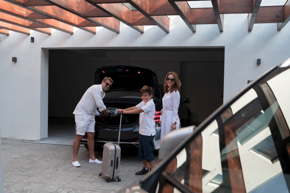 A photo of a modern family carrying suitcases from a garage to their luxury seaside home during a vacation. Vacation concept. Selective focus. High-quality photo. A photo of a modern family carrying suitcases from a garage to their luxury seaside home during a vacation. Vacation concept. Selective focus