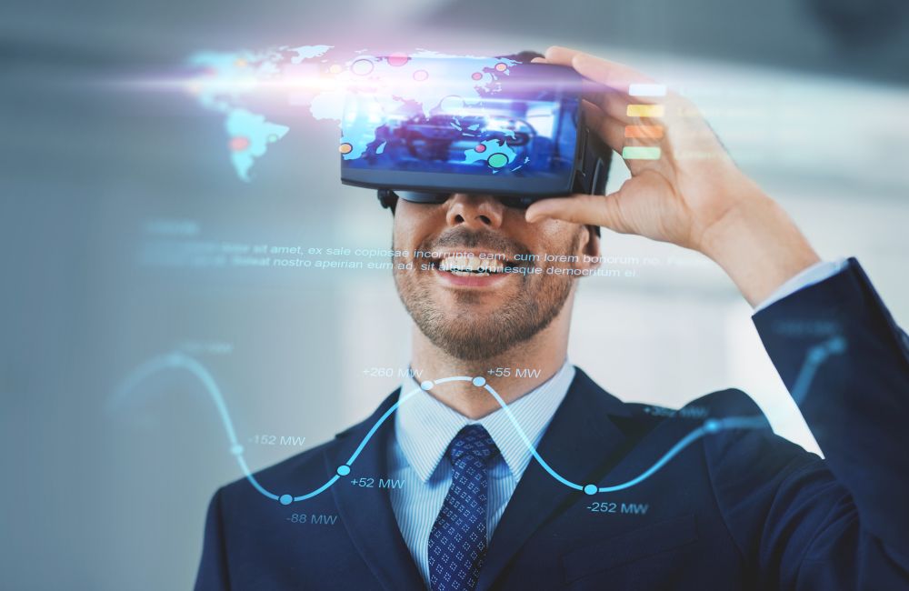 business, technology and augmented reality concept - businessman with vr headset and hologram of data at office. businessman with virtual reality headset at office