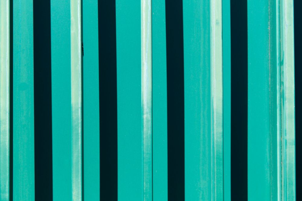 texture and background concept - turquoise ribbed surface. ribbed turquoise surface