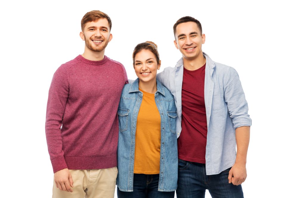 friendship and people concept - group of smiling friends over white background. group of smiling friends