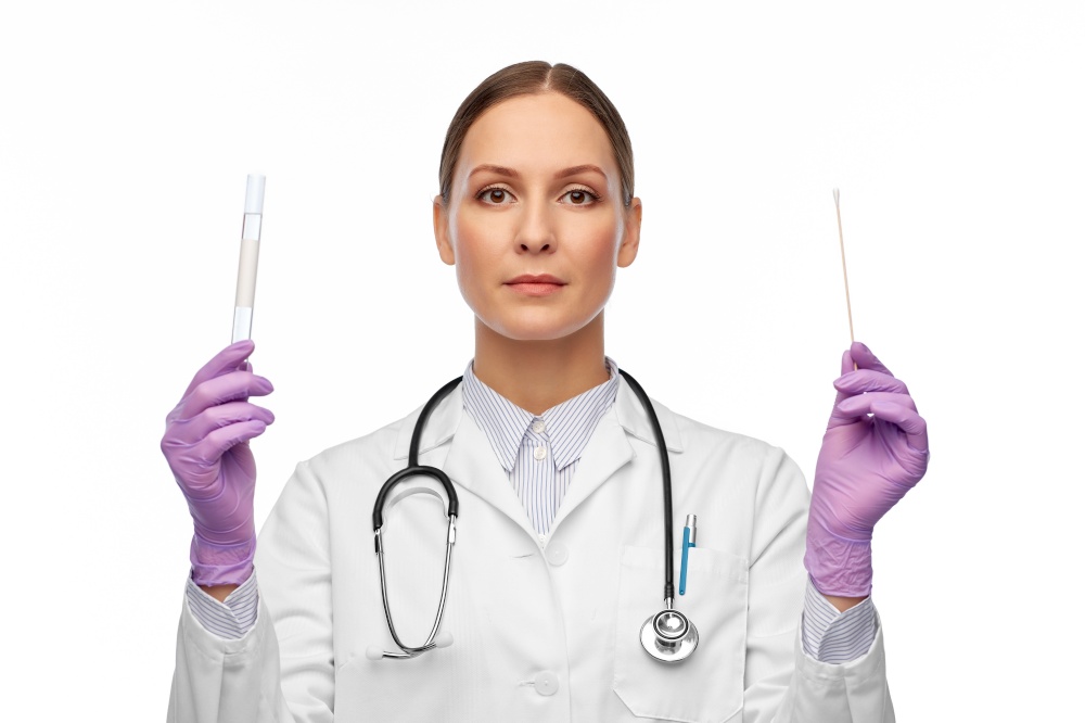 medicine, health and coronavirus concept - female doctor with test tube and cotton swab. female doctor with test tube and cotton swab