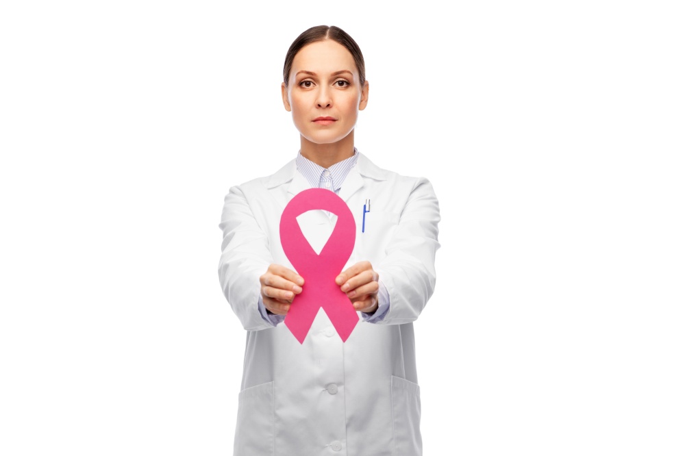 medicine, healthcare and oncology concept - female doctor in white coat with pink breast cancer awareness ribbon. female doctor with breast cancer awareness ribbon