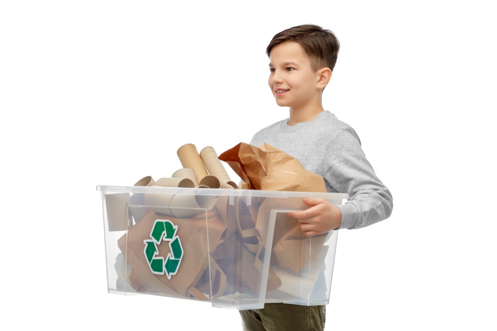 recycling, waste sorting and sustainability concept - smiling boy with paper garbage in plastic box over white background. smiling boy sorting paper waste