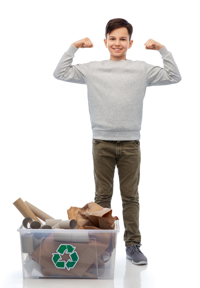 recycling, waste sorting and sustainability concept - smiling boy with paper garbage in plastic box showing power over white background. smiling boy sorting paper waste