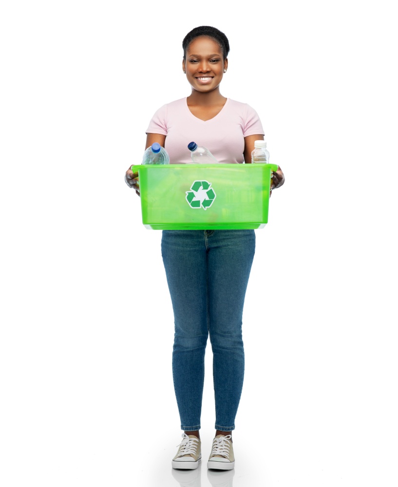 recycling, waste sorting and sustainability concept - smiling young african american woman holding box with plastic bottles over white background. smiling young asian woman sorting plastic waste