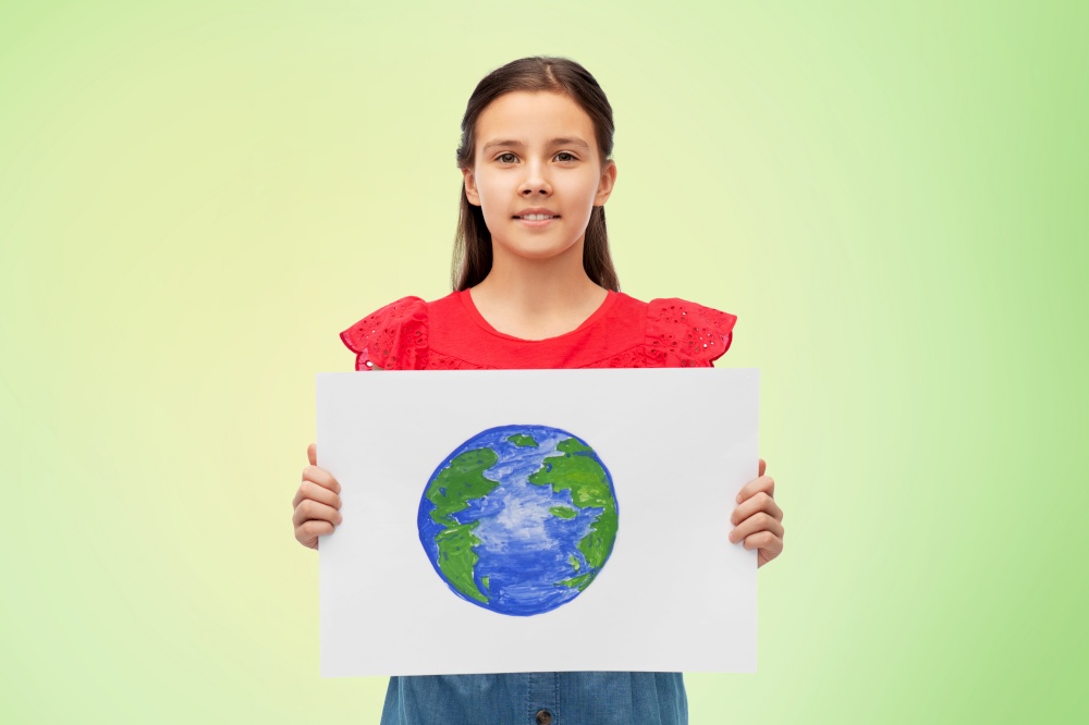 eco living, environment and sustainability concept - smiling girl holding drawing of earth planet over lime green natural background. smiling girl holding drawing of earth planet