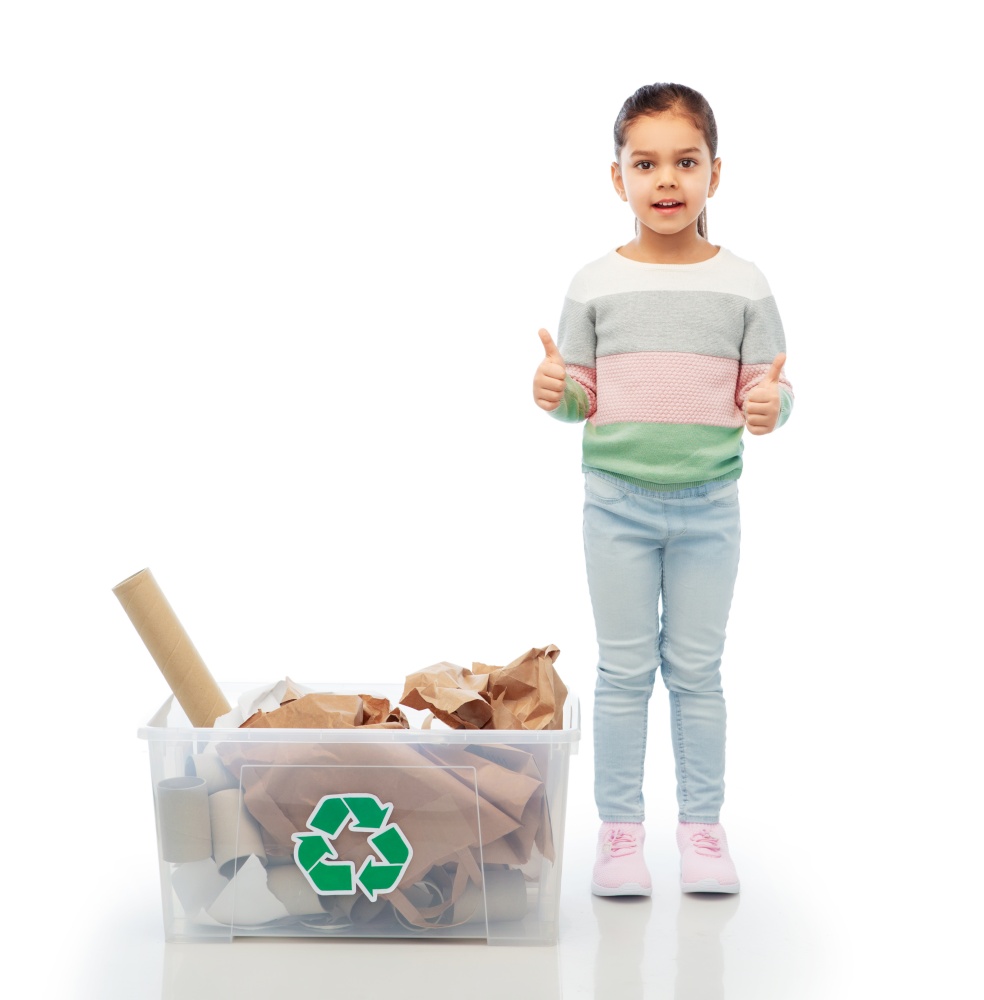 recycling, waste sorting and sustainability concept - smiling girl with paper garbage in plastic box showing thumbs up over white background. girl sorting paper waste and showing thumbs up