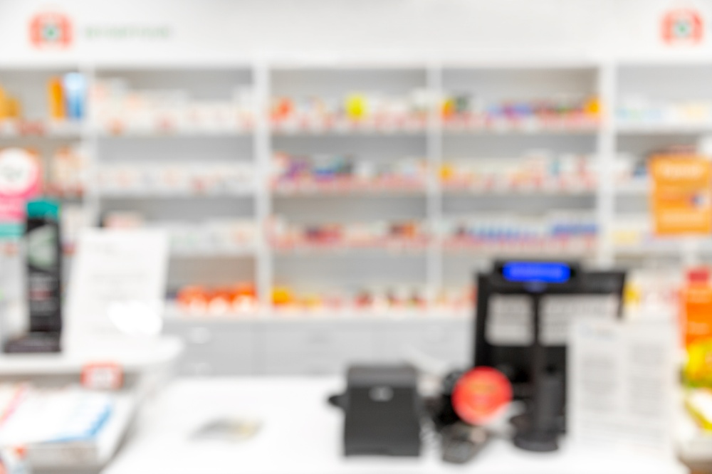 medicine, pharmaceutics and healthcare concept - blurry background of pharmacy. blurry background of pharmacy
