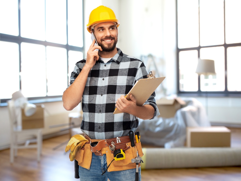 repair, construction and building concept - happy smiling worker or builder with clipboard calling on smartphone over home room background. builder calling on smartphone at home