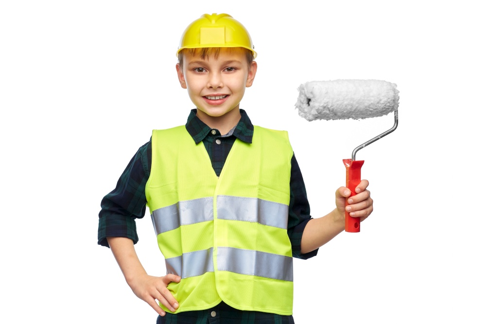 building, construction and profession concept - happy smiling little boy in protective helmet and safety vest with paint roller over white background. little boy in protective helmet with paint roller