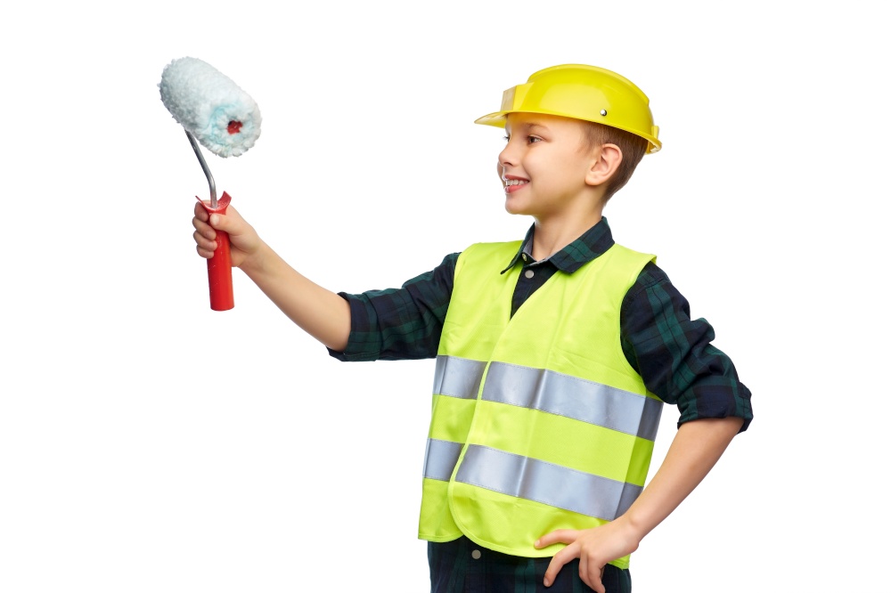 building, construction and profession concept - happy smiling little boy in protective helmet and safety vest with paint roller painting something imaginary over white background. little boy in protective helmet with paint roller