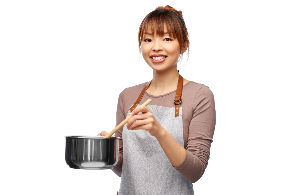 culinary and people concept - happy smiling female chef in jacket with saucepan cooking food over white background. happy smiling female chef with saucepan