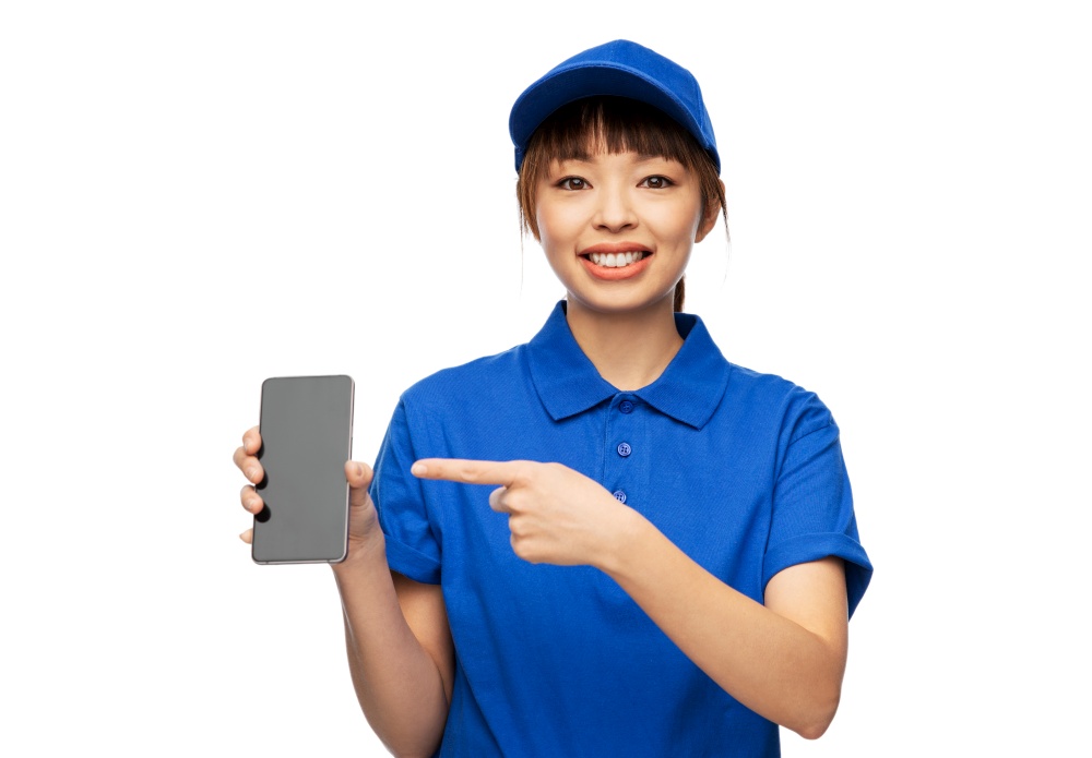 profession, job and people concept - happy smiling delivery woman in blue uniform with smartphone over white background. happy delivery woman with smartphone