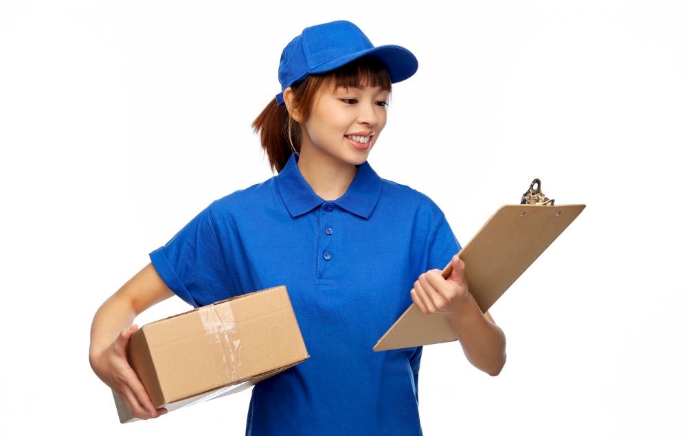 mail service and shipment concept - happy smiling delivery woman in blue uniform with parcel box and clipboard over white background. happy delivery woman with parcel box and clipboard