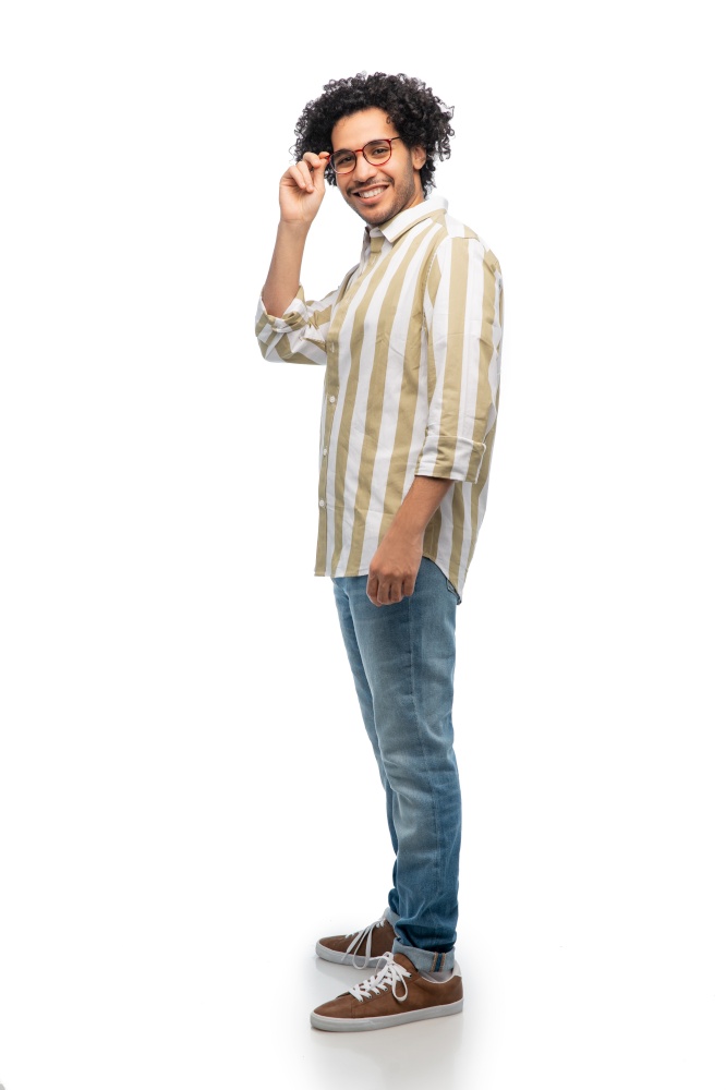 people concept - smiling young man in glasses over white background. smiling young man over white background