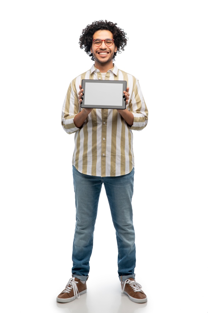 technology and people concept - happy young man in glasses with tablet computer over white background. happy young man with tablet computer