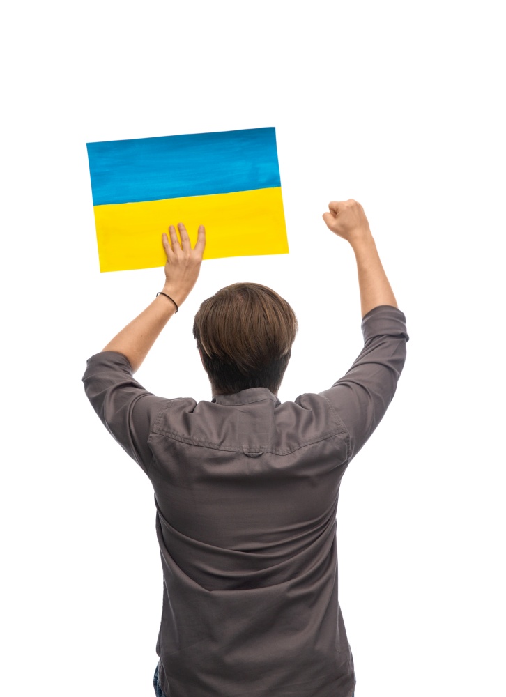 independence day, patriotic and human rights concept - man holding flag of ukraine on demonstration over white background. man holding flag of ukraine