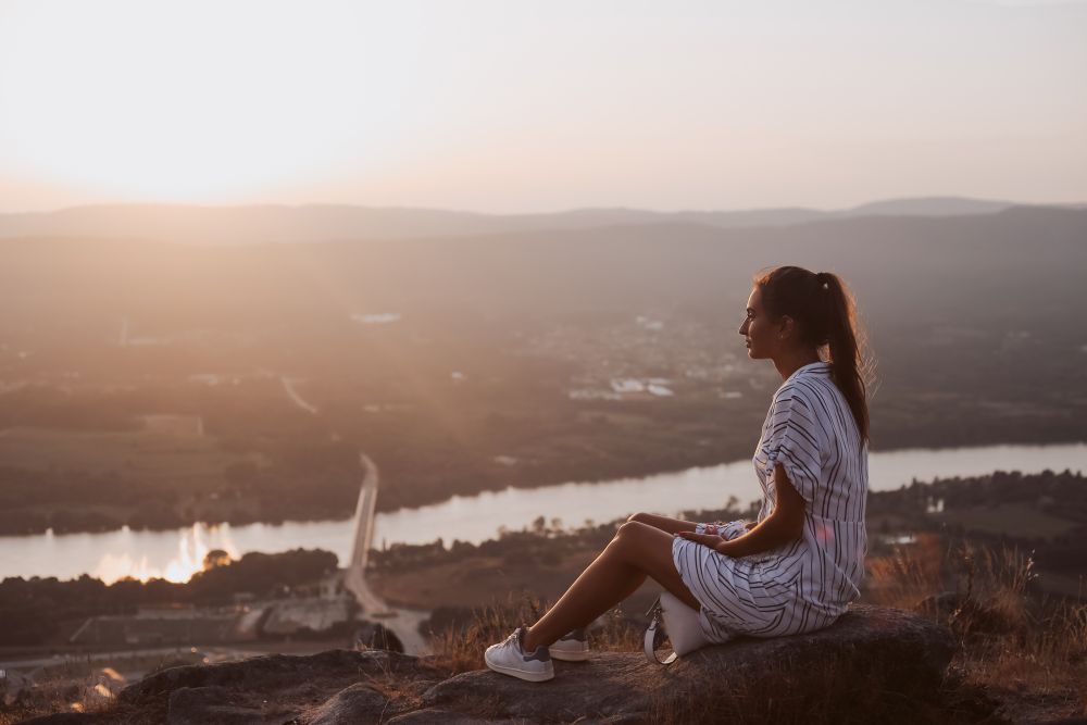 Woman relaxing and enjoying a fantastic view