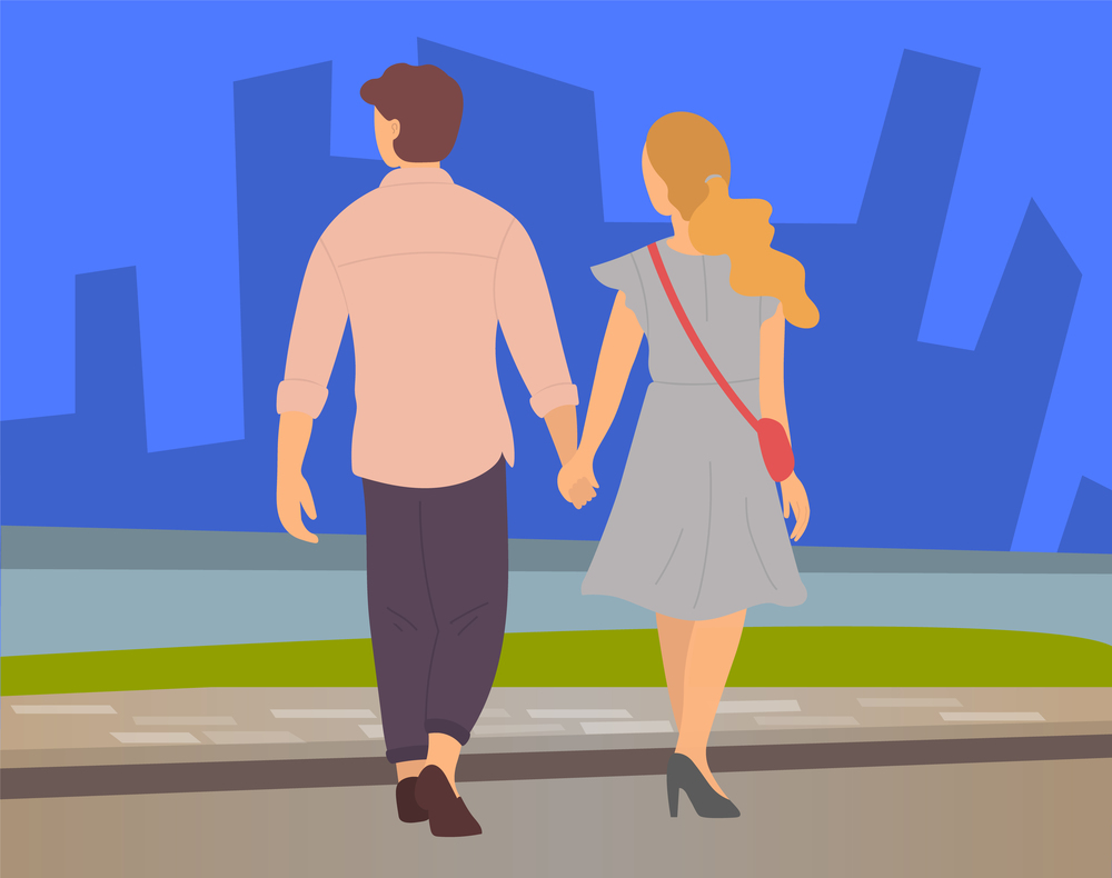 Young couple, back view, blond girl and guy in brown trousers, walk in evening city. River, skyscrapers, buildings background. Happy people hold hands and smile. Outdoor activities, open air walking. Couple walks in cityscape, young couple holding hands. Walks in open air, night city, skyscrapers