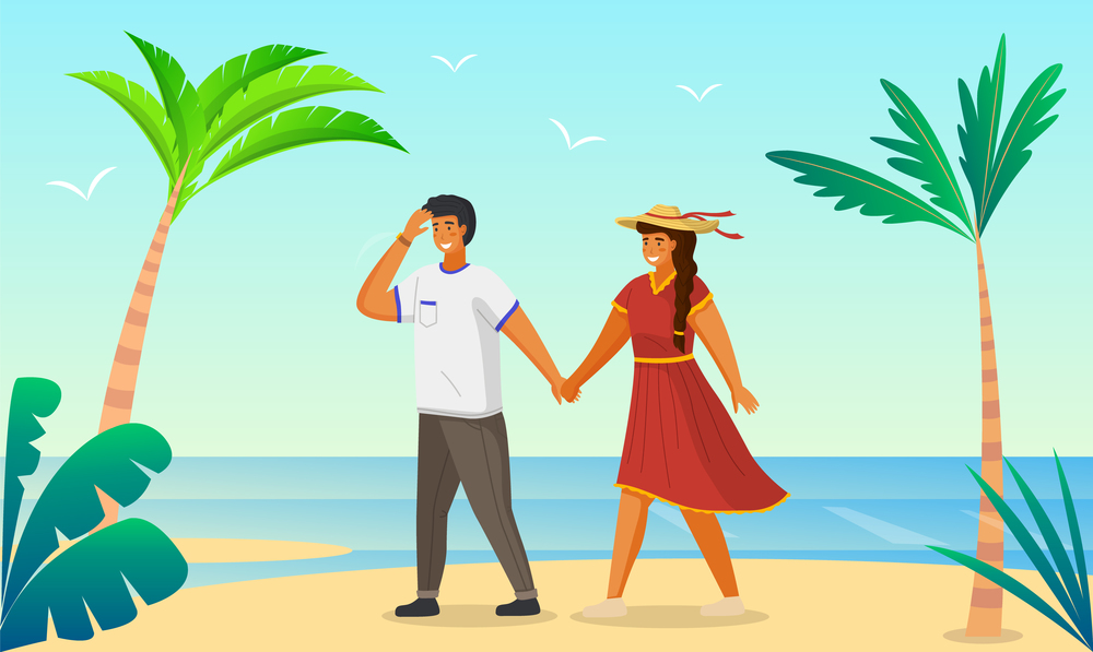 Couple walking together on the seashore. Young guy and girl wearing a light dress and a straw hat holding hands walking on the sandy shore with palm trees. Man and woman meeting in summer vacation. Couple walking on the seashore, man and woman holding hands walking on sandy shore with palm trees