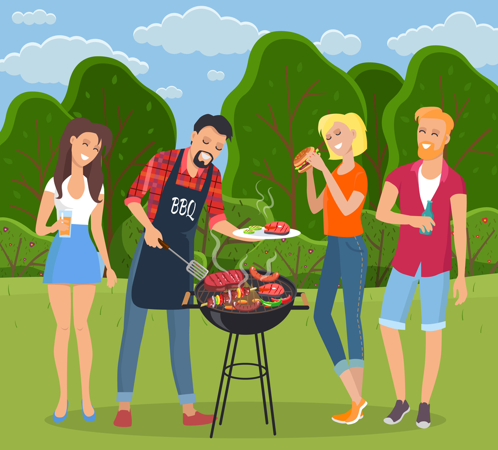 Young people having picnic in countryside. Man in BBQ apron grilling barbecue. Plate with meat. Girl has hamburger, female drinks cola, bearded red-haired man drinks beer or water. Green landscape. Rest in countryside, people grill barbecue. Men and women rest and eat. Summertime, green landscape