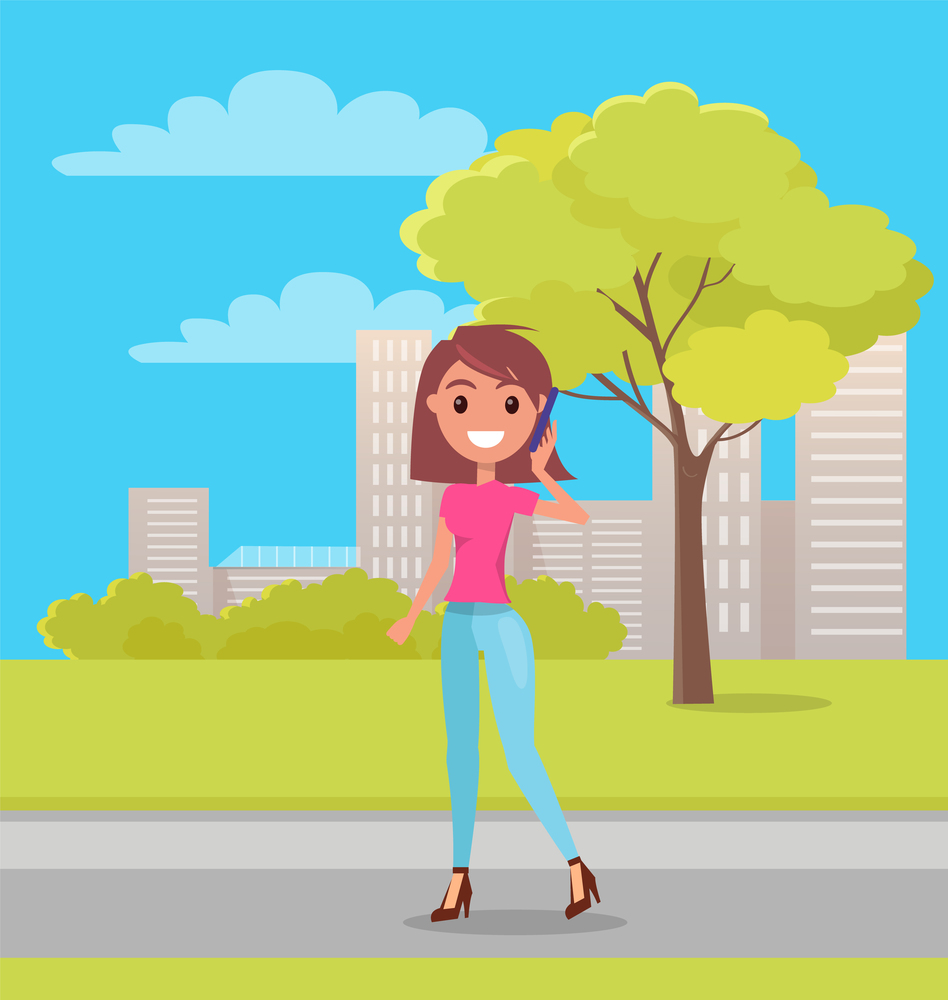 Young smiling girl wearing pink t-shirt and jeans, stylish shoes at heels. Fashionable woman with bob hairstyle walking in green park at urban view background. Cheerful girl posing, talking by phone. Happy smiling woman talking by phone walking in green summer park at urban view background