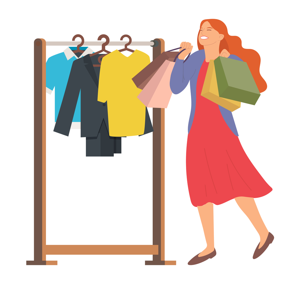 Woman with shopping bags. Young beautiful happy girl picks up multi-colored packages. Female character is choosing outfit to wear. Clothes fitting. Hanger with items of clothing on the background. Woman is choosing outfit to wear. Young girl picks up packages and rejoices. Clothes fitting