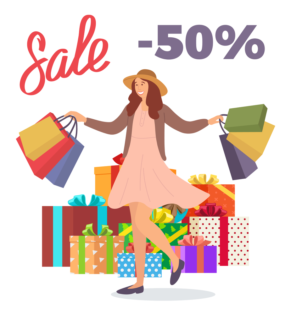 Smiling woman with shopping bags in her hands. Young beautiful happy girl jumping and picking up multi-colored packages with clothes. Big present boxes on the background. Holliday sale concept. Young happy girl jumps and picks up packages. Big present boxes on the background. Holliday sale