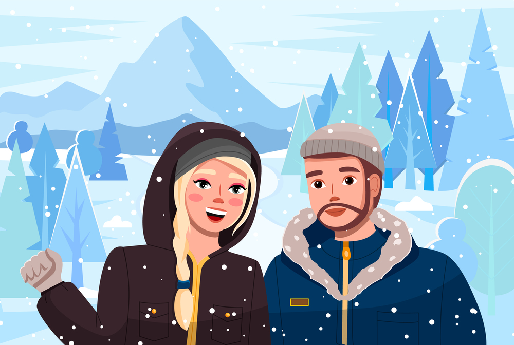 Girl with man on winter suburban landscape. Cute couple walk in the forest at the foot of the mountains in winter time. People wearing in warm jackets with a hood, woman smiling waving hand. Girl with man on winter suburban landscape. People walk at the foot of the mountains in winter time