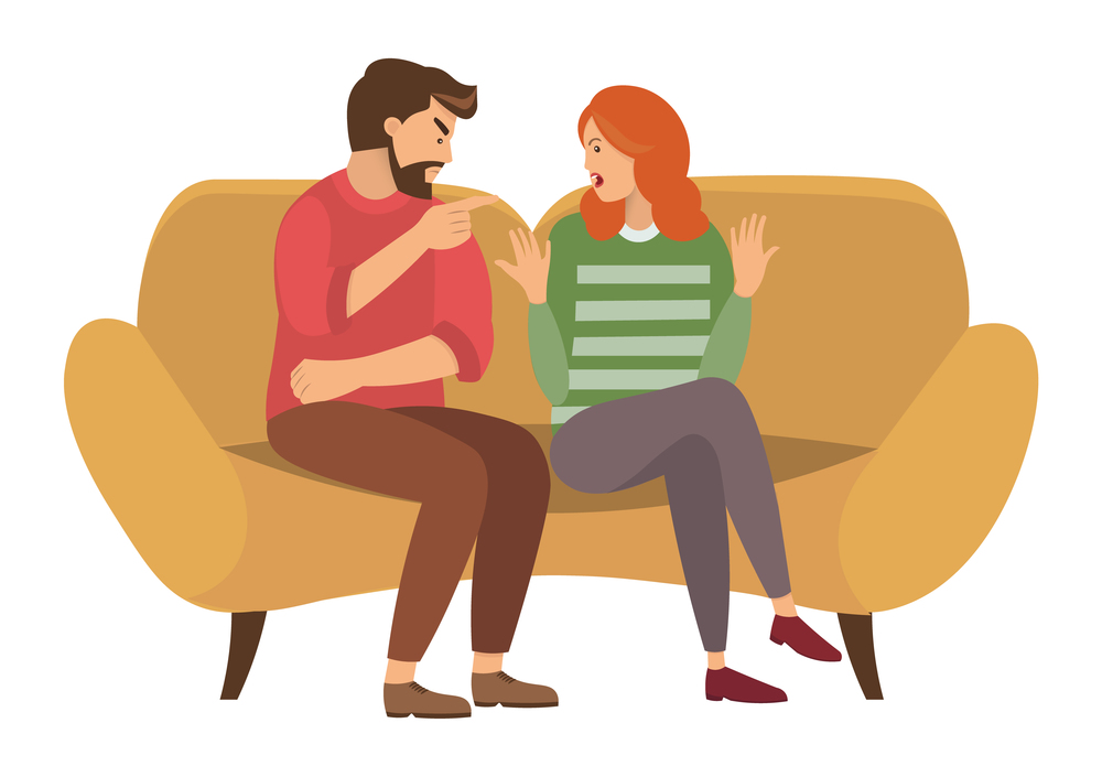 A man and a woman are sitting on a large yellow sofa. A couple of people quarrels sitting on the couch. Angry man points finger and yells at girl. Redhead girl is raising her hands in indignation. A man and a woman are sitting on a large sofa. A couple of people quarrels sitting on the couch