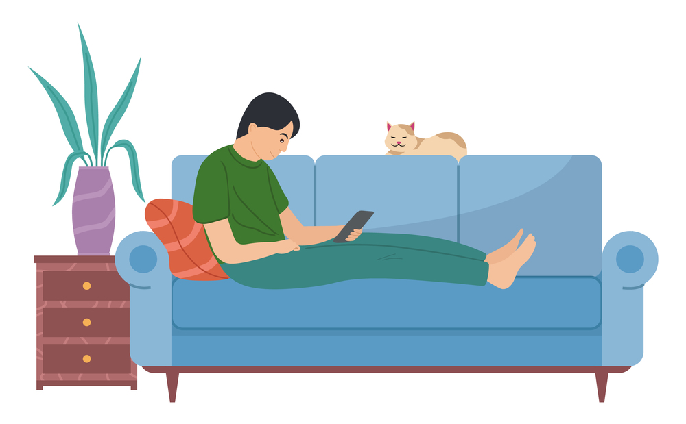 Young man is lying on the couch with a tablet. The guy sits with electronic equipment in his hands. The cat lies on the sofa bed. Male character playing on his tablet flat vector illustration. Young man lying on the couch with a tablet. The guy sits with electronic equipment in his hands