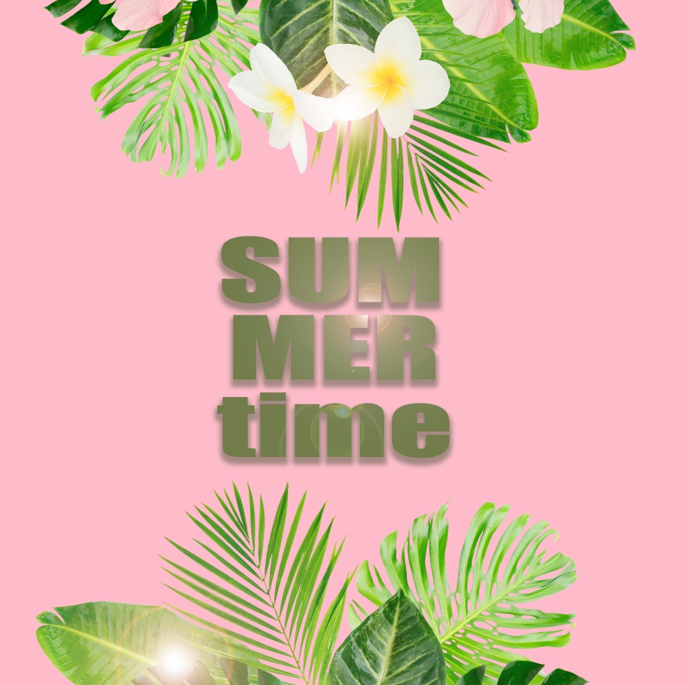 Tropical green leaves and flowers borders on pink background with copy space. Tropical green leaves