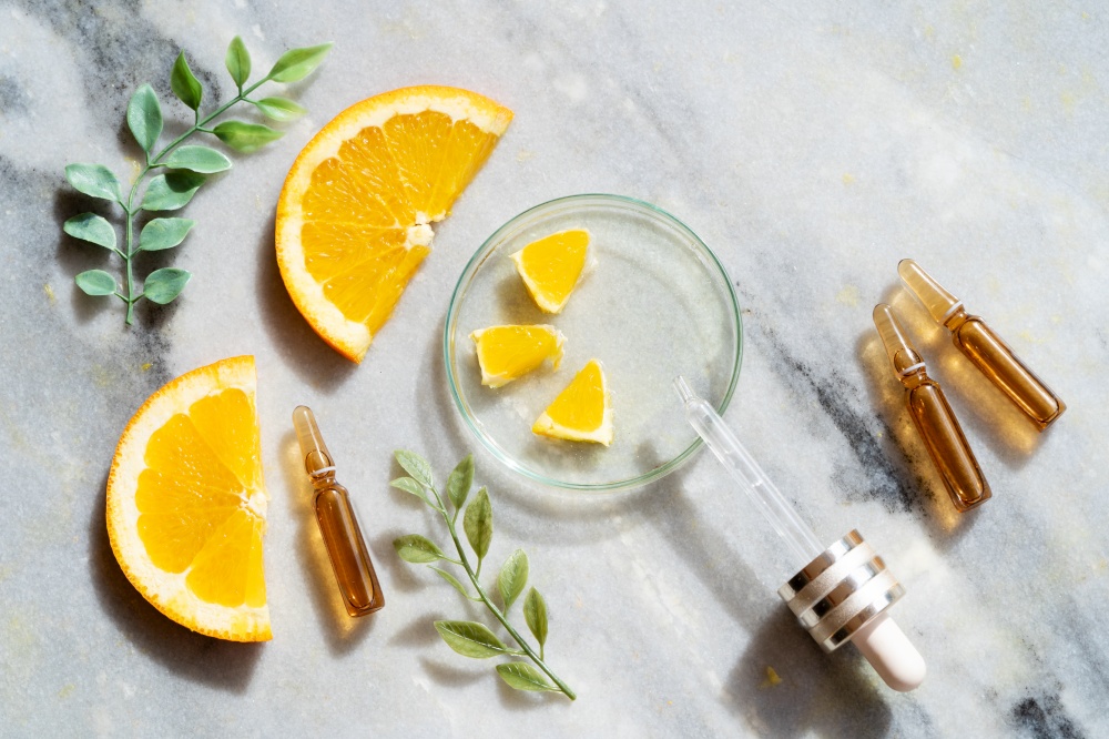 Citrus fruit vitamin c serum oil beauty care, anti aging natural cosmetic, laboratory creating anf testing concept. Citrus fruit vitamin c serum oil beauty care