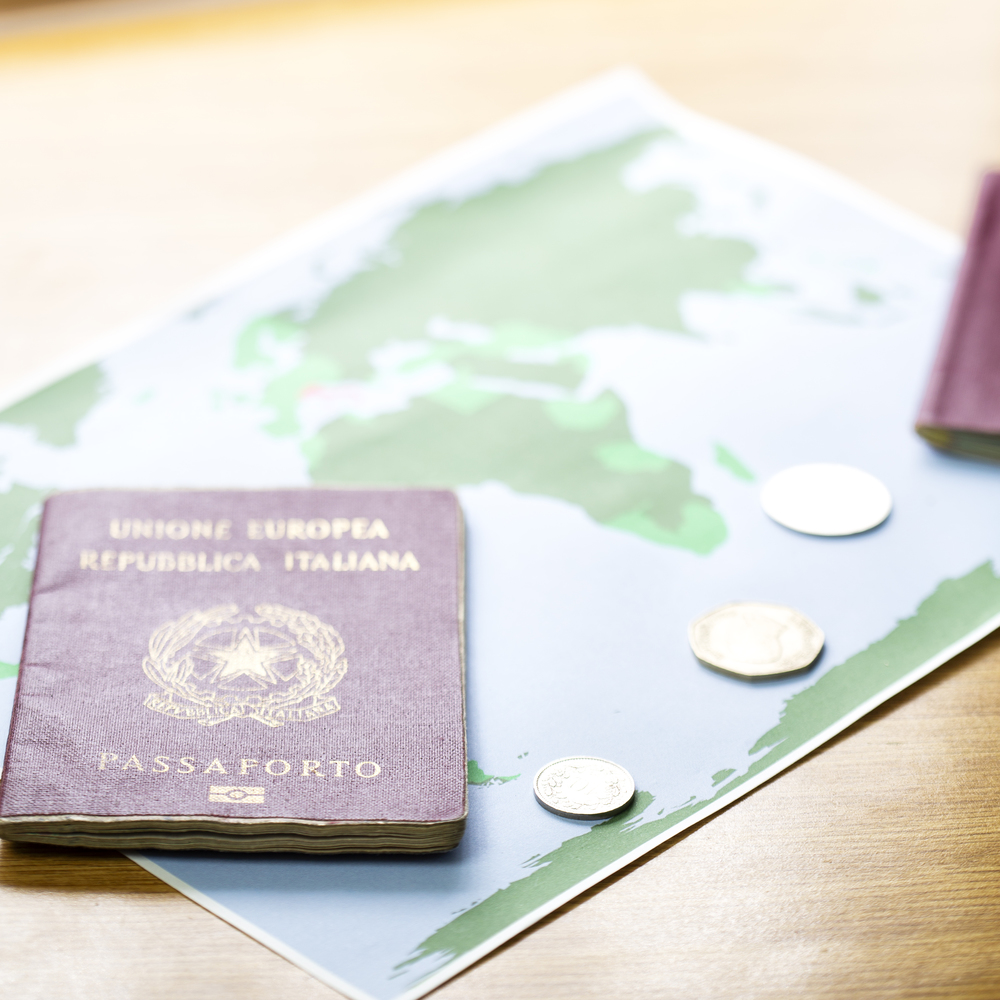 blur and passport in the world map background like concept of travel   in a table