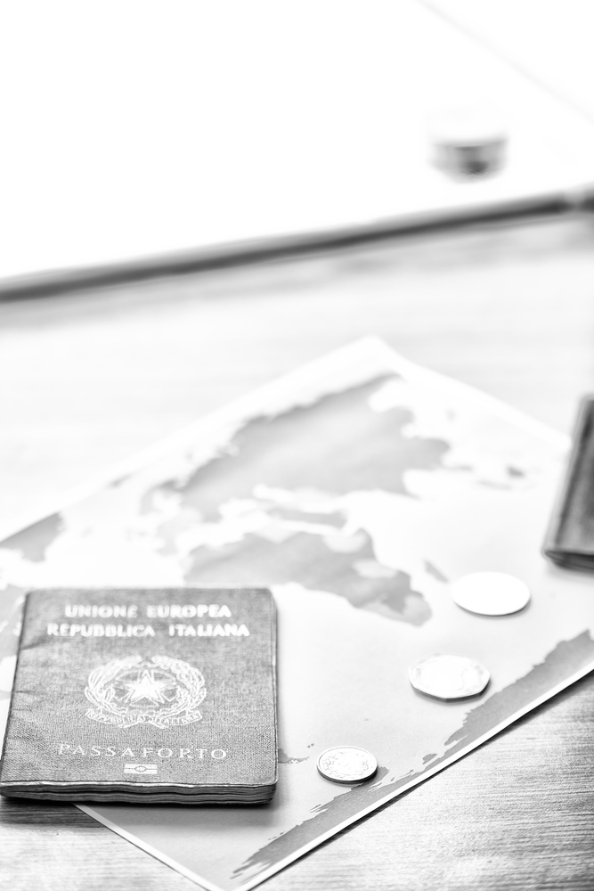 blur and passport in the world map background like concept of travel   in a table